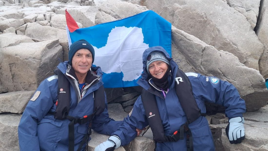 Travellers with the Antarctica flag