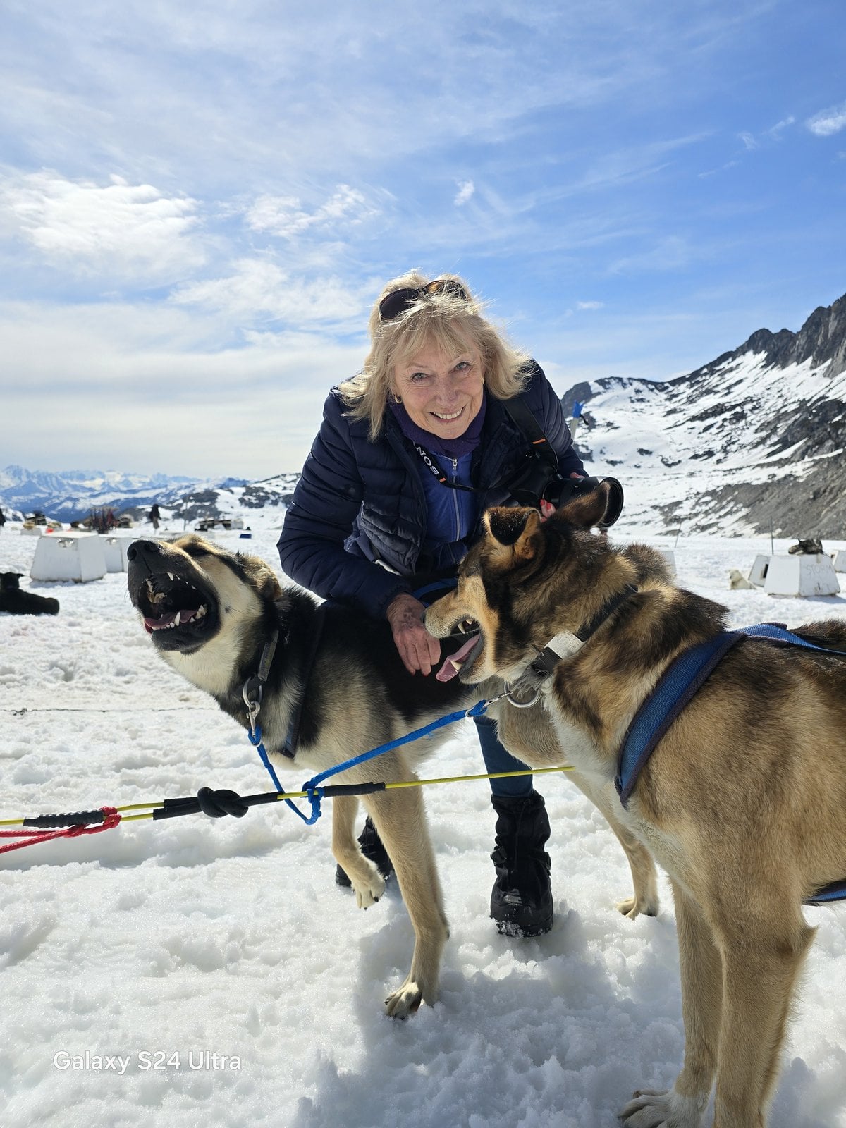 Travellers with huskies in Skagway, Alaska
