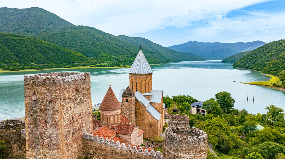 Ananuri Fortress beside a turquoise reservoir, Georgia