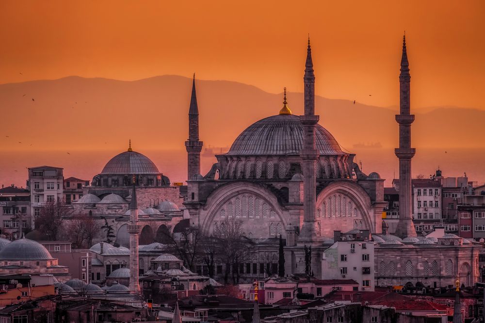 Historic mosque domes and minarets at sunset, Istanbul, Turkey